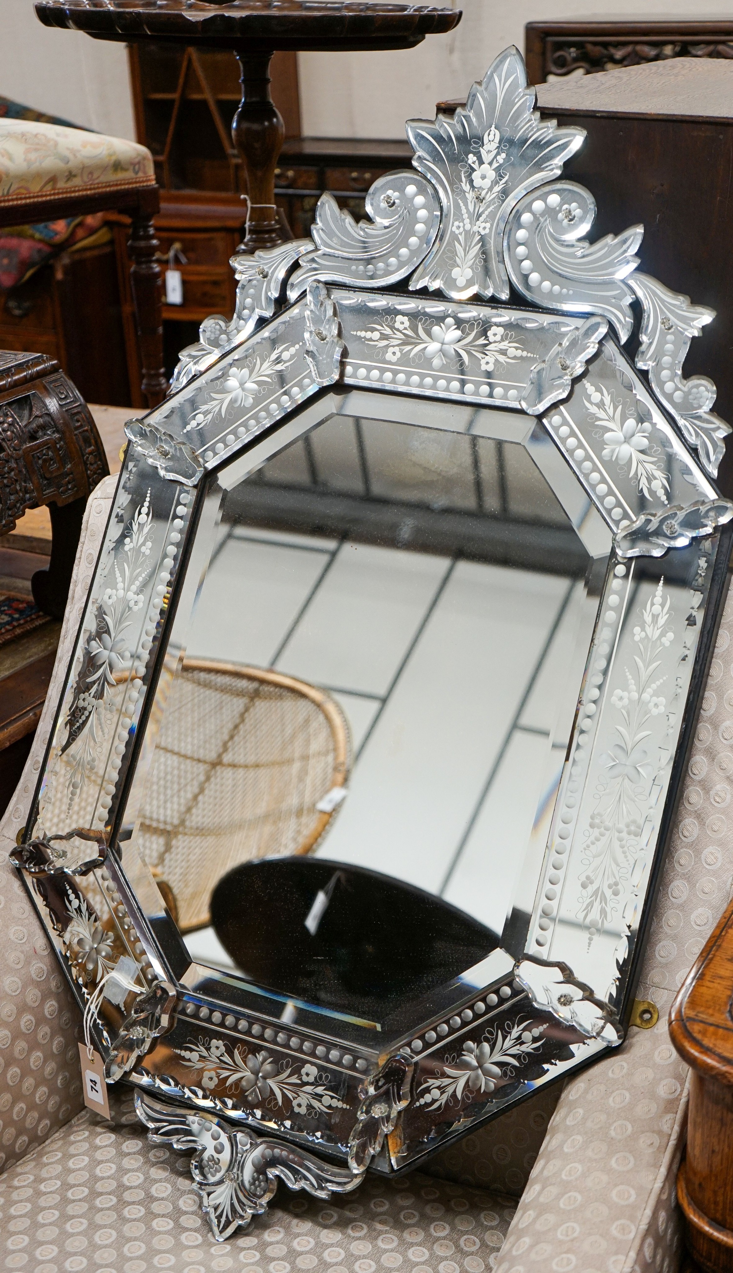 A Venetian style engraved octagonal wall mirror, width 60cm, height 108cm